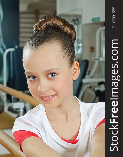 Portrait of young beauty gymnast in gymnasium. Portrait of young beauty gymnast in gymnasium
