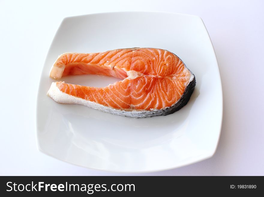 Salmon dish with fresh and uncooked prepared for smoking. Salmon dish with fresh and uncooked prepared for smoking