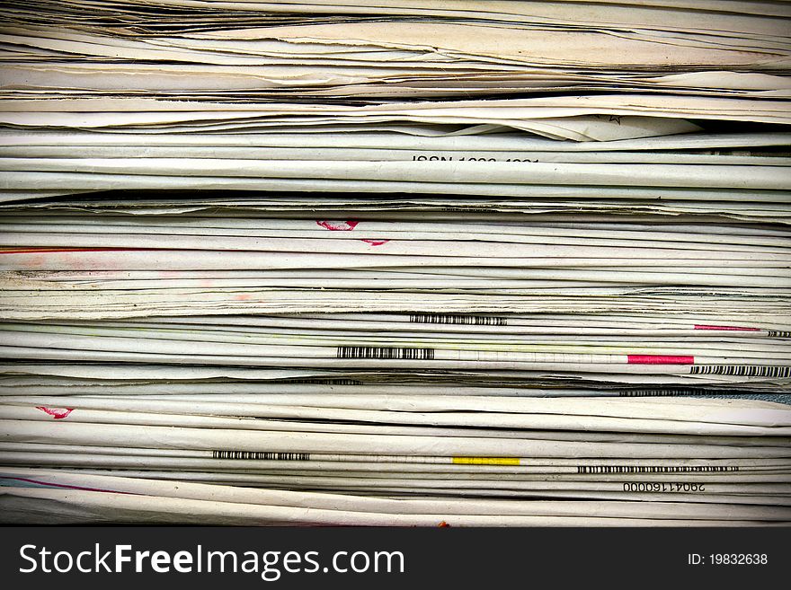 Old stack of newspapers background