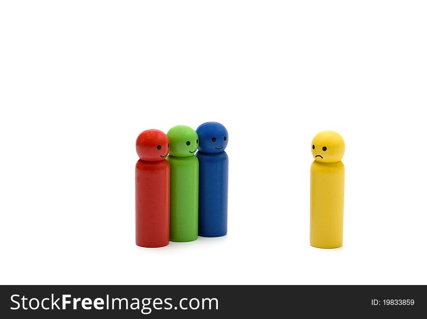 Wooden little men on white background