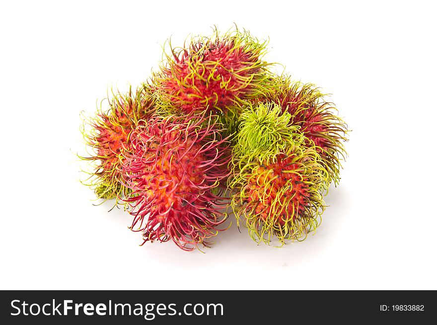 Rambutan is a tropical fruit in white background