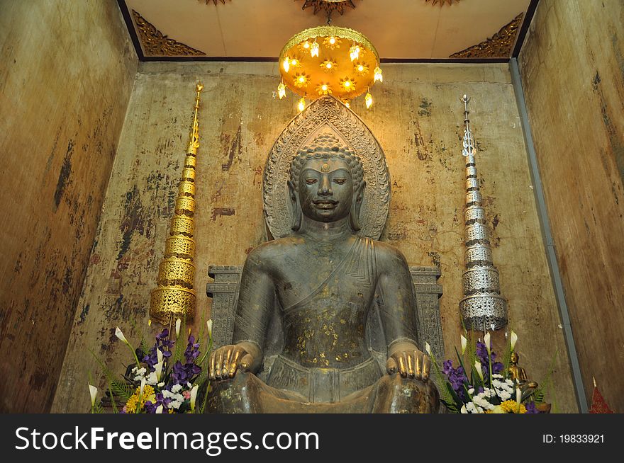 Statue of old buddha at thailand temple, Thailand