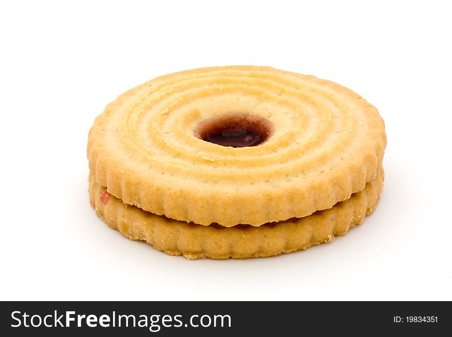 Single jam filled biscuit over white