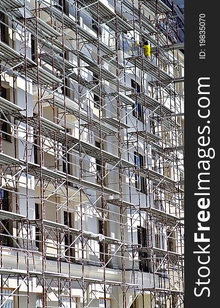 Scaffold against building under restoration