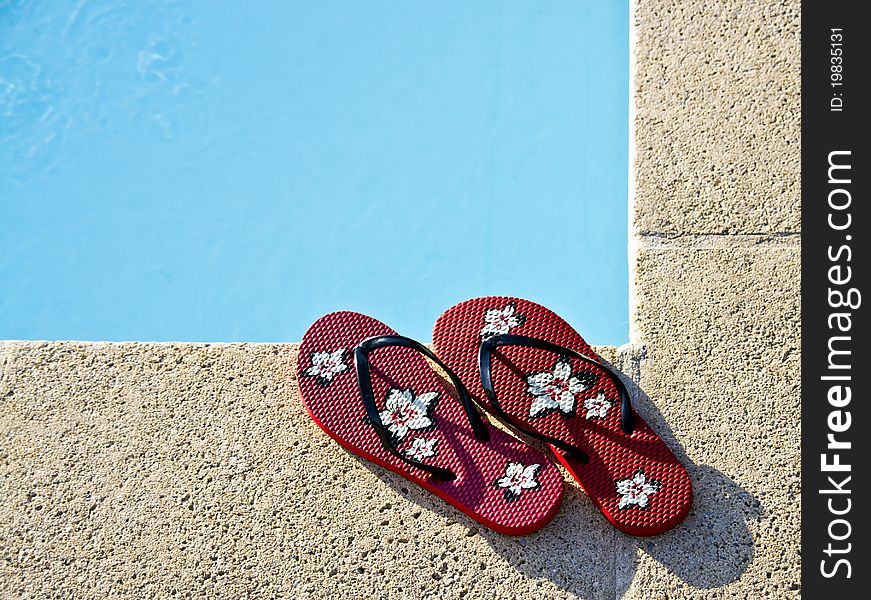 Flip-flops by the pool with great light and amazing colors