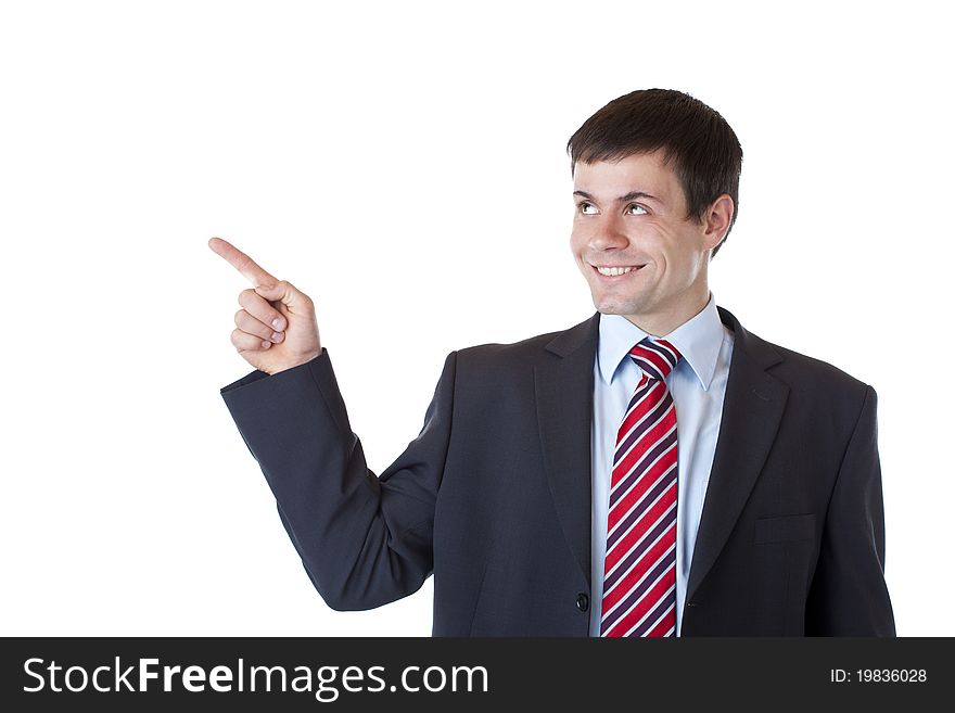 Young business man points with finger to ad space and smiles. Isolated on white background. Young business man points with finger to ad space and smiles. Isolated on white background.