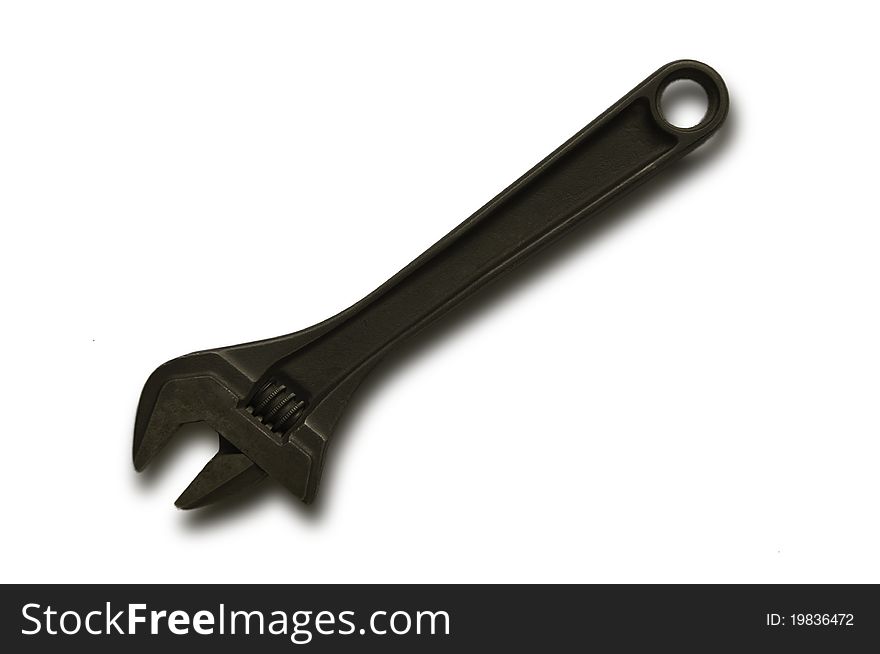 Old wrench isolated with with background