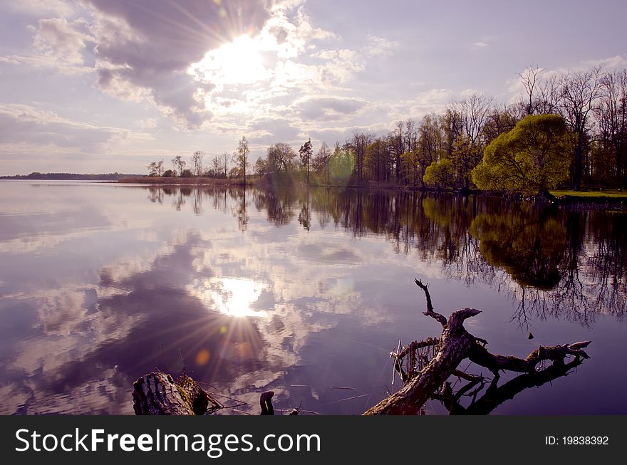 Evening lake landscape with clouds