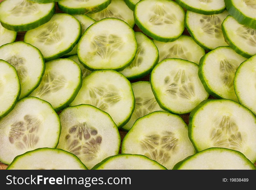 Cucumber and a lot of slices. Cucumber and a lot of slices