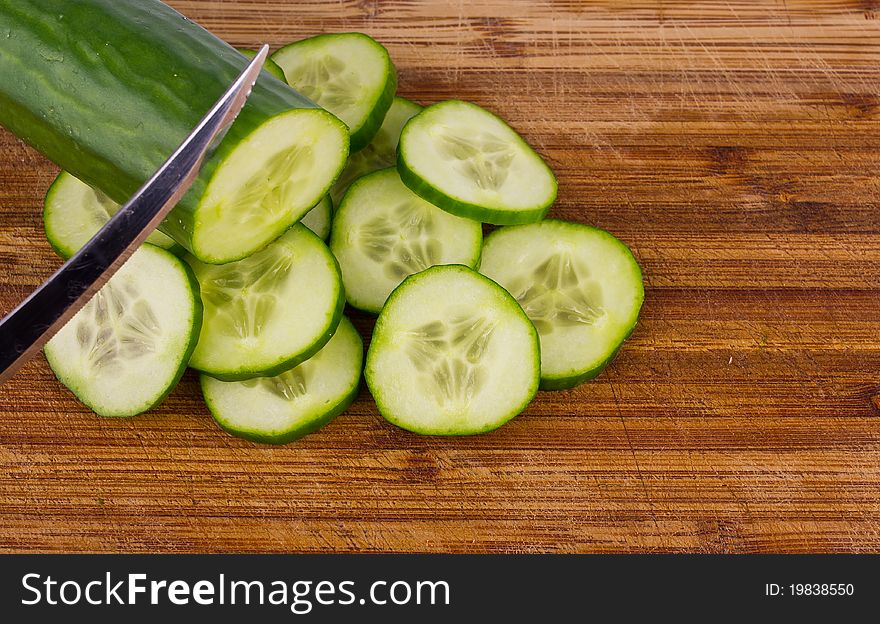 Cucumber and a lot of slices. Cucumber and a lot of slices