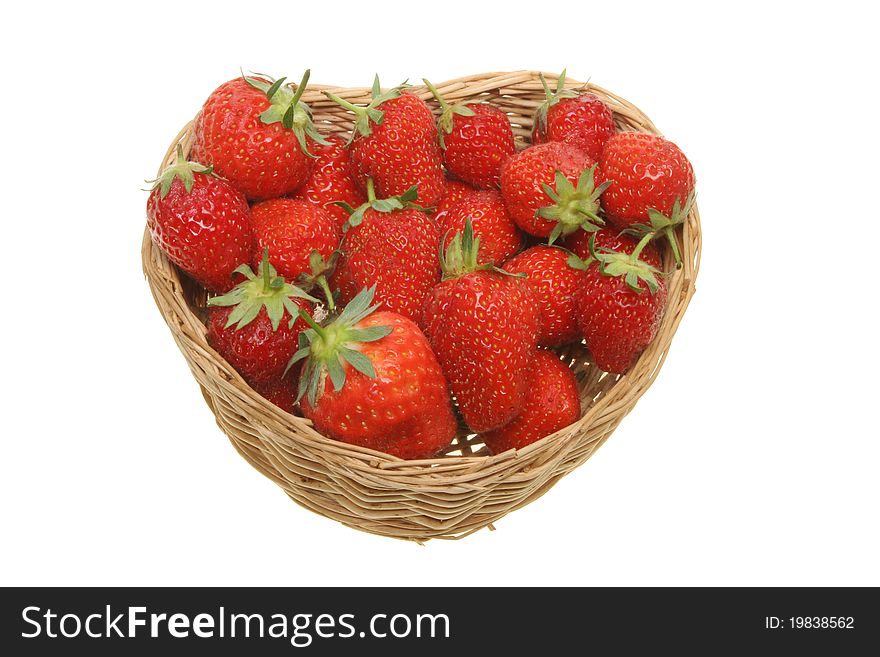 Fresh ripe strawberries in a heart shaped basket. Fresh ripe strawberries in a heart shaped basket