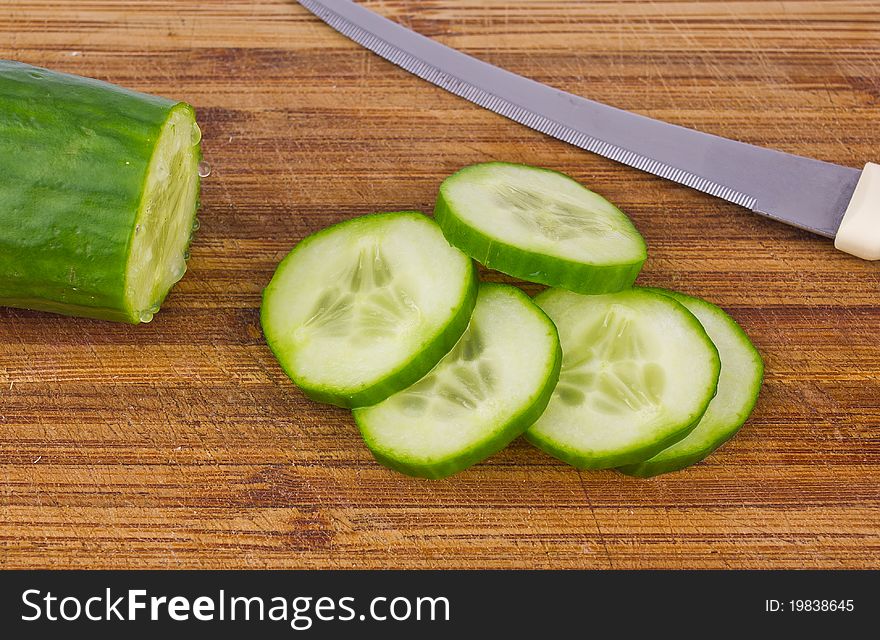 Cucumber and a lot of slices. Cucumber and a lot of slices