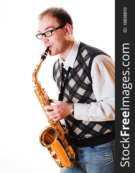 Portrait of a man with a saxophone/playing on sax isolated on white