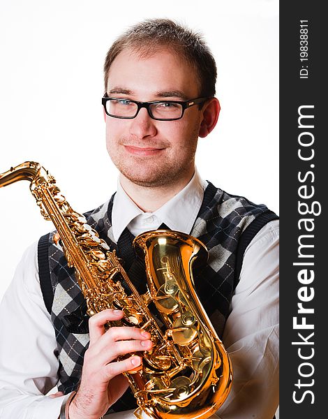 Portrait of a man with a saxophone/playing on sax isolated on white
