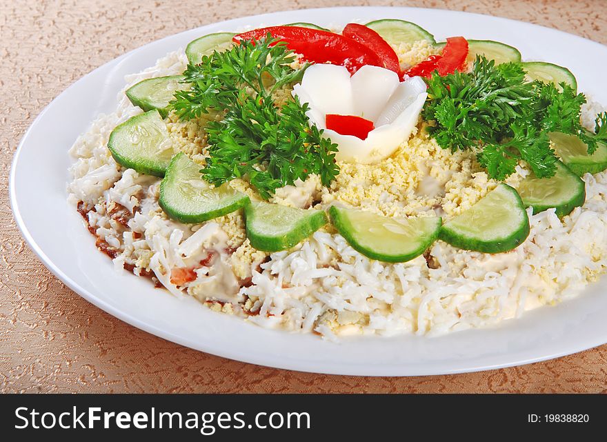 Salad with eggs, tomatoes, cucumbers and parsley on white plate. Salad with eggs, tomatoes, cucumbers and parsley on white plate