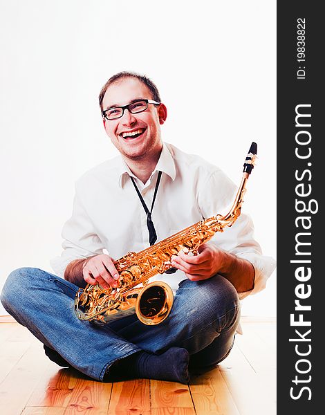 Portrait of a man with a saxophone