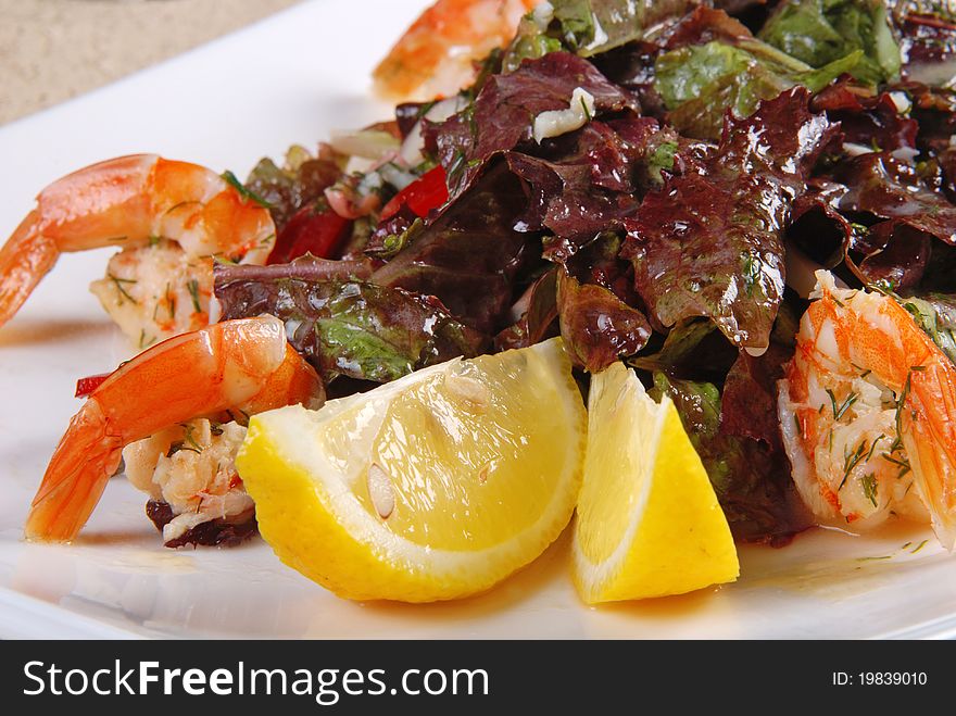 Shrimp salad on white plate. Restaurant. Shrimp salad on white plate. Restaurant