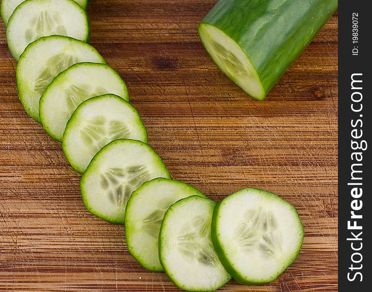 Cucumber and a lot of slices. Cucumber and a lot of slices