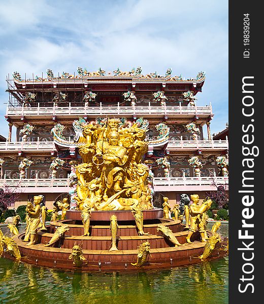 Goddess Naja beating the dragon at china temple in Chonburi Thailand (Vertical). Goddess Naja beating the dragon at china temple in Chonburi Thailand (Vertical)