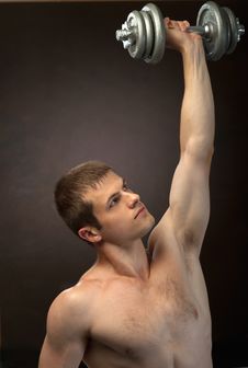 Young Man  With  Weights Stock Photography