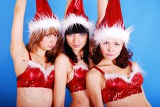 Female Models In Santas Cap. Royalty Free Stock Image