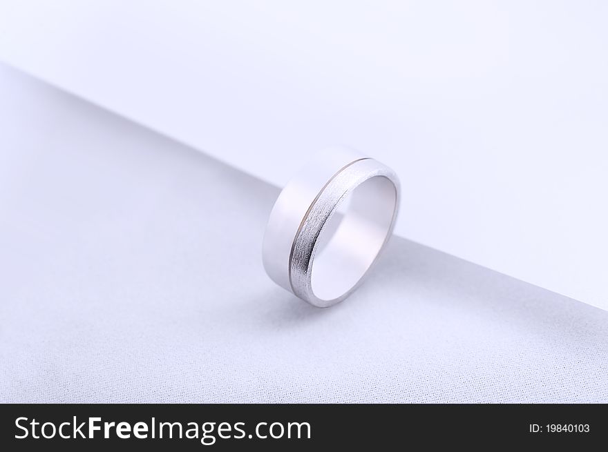 Diamond wedding rings on white background