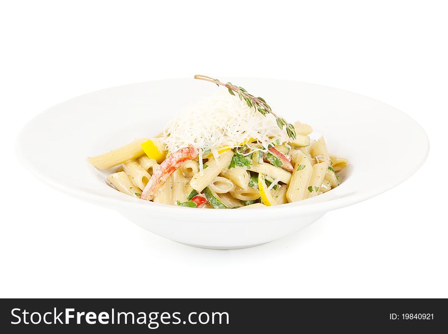 Penne with sauce in white plate isolated on white background