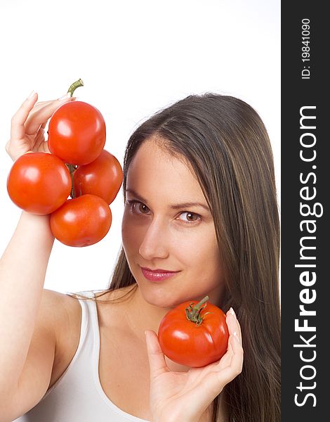 Young woman holding fresh tomatoes. Young woman holding fresh tomatoes