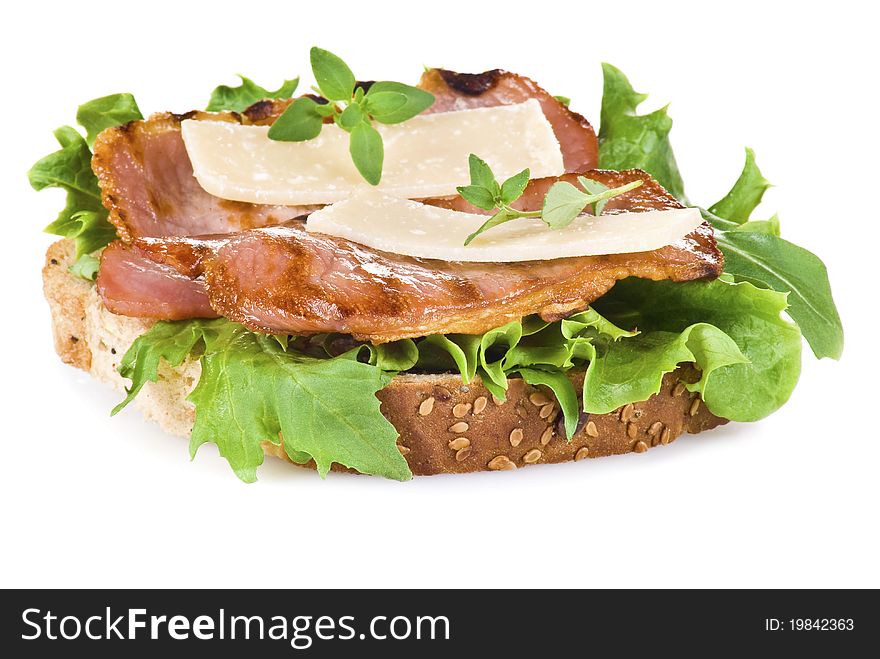 Freshly made bacon sandwich isolated over white background