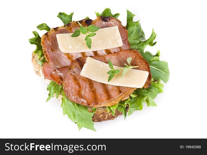 Freshly made bacon sandwich isolated over white background