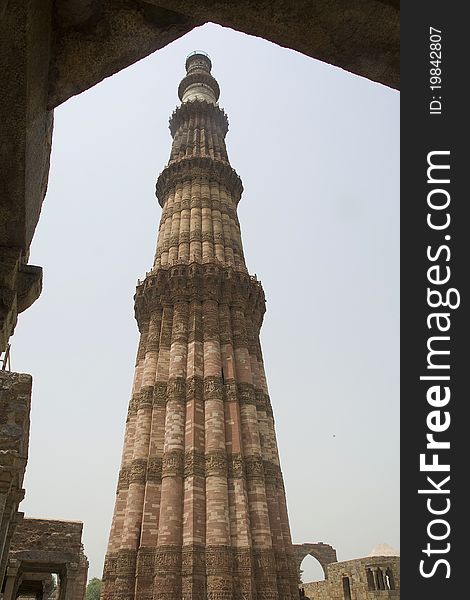 Framed view of Qutub Minar, New Delhi, India, Asia