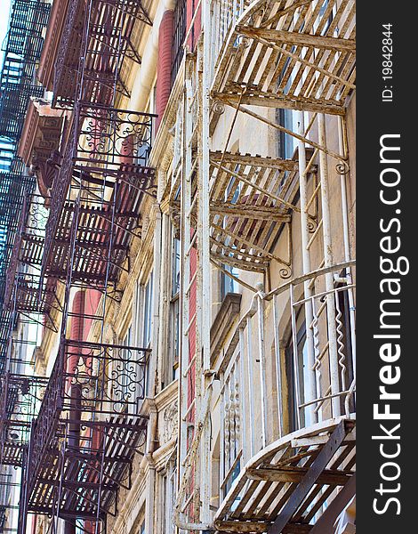 A jungle of wrought iron fire escapes. A jungle of wrought iron fire escapes