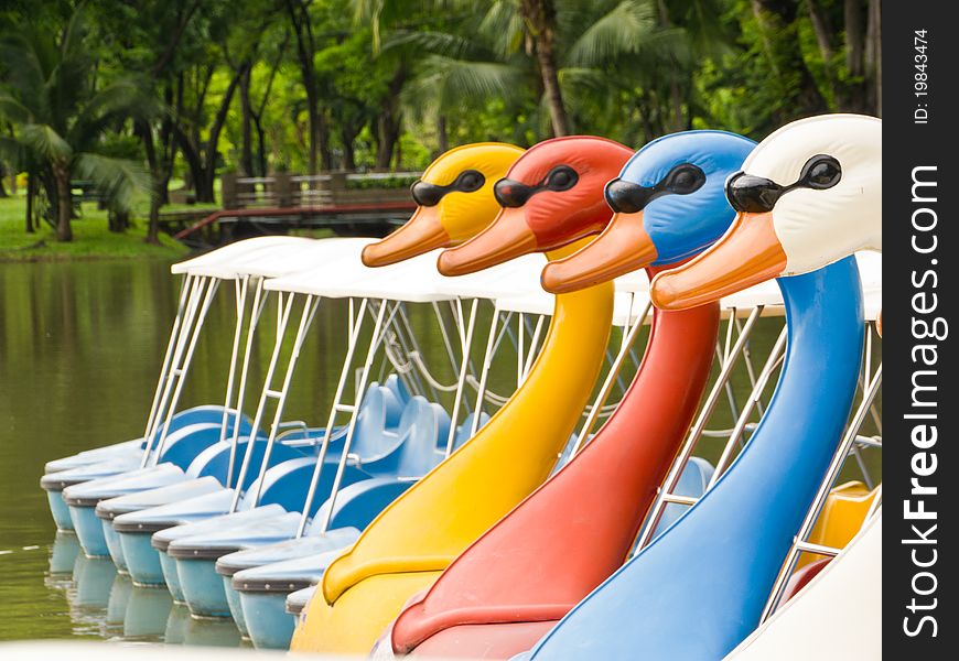 Colorful watercycle boat in park for relaxing