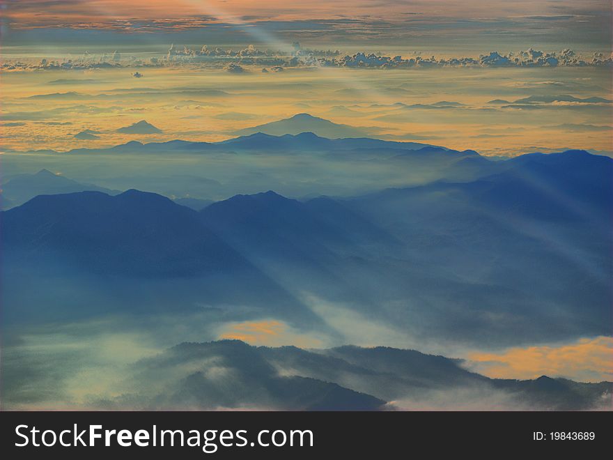 Scenic view of the mountains during sunrise. Scenic view of the mountains during sunrise