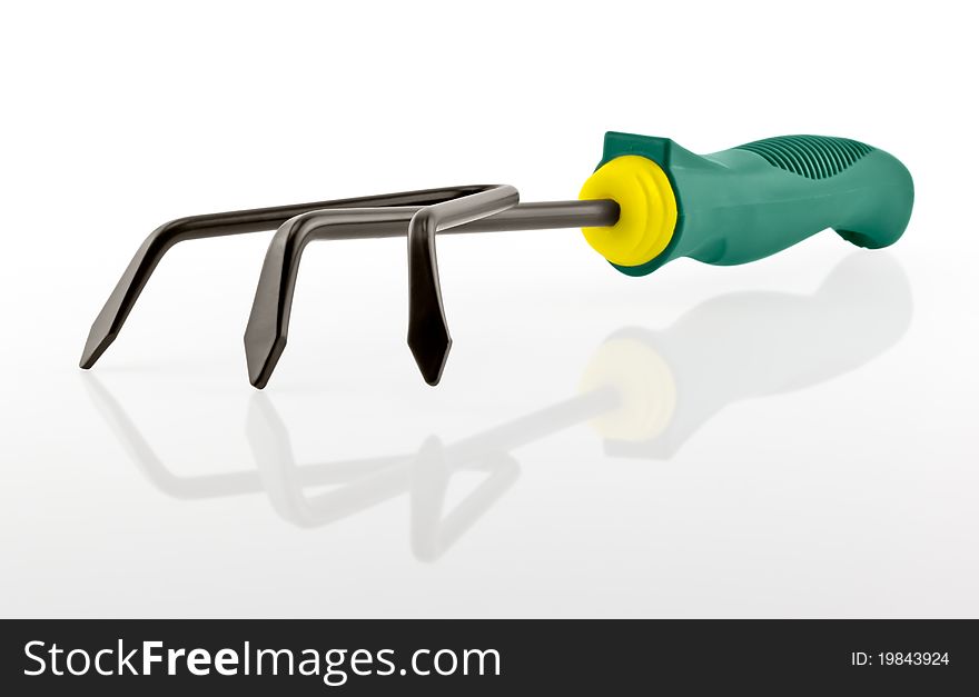 Garden rake isolated on a white background