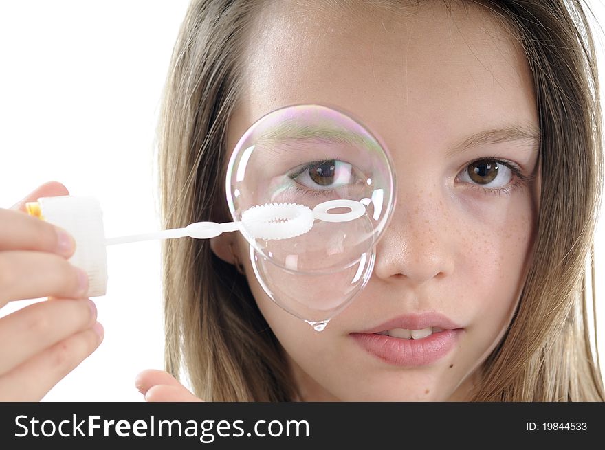 Isolated bubbles and beautiful smiling girl in background. Isolated bubbles and beautiful smiling girl in background