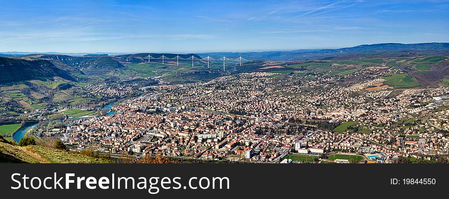 Bird's eye view view of the Viaduct and the Town of Millau. Aveyron, France. Early morning. Bird's eye view view of the Viaduct and the Town of Millau. Aveyron, France. Early morning.