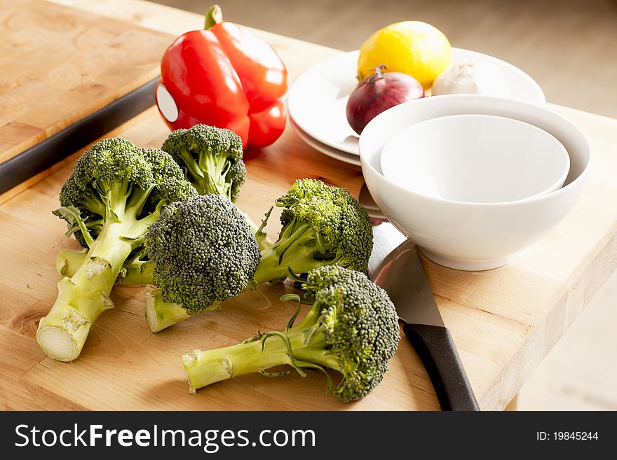 Mixed vegetables on a cutting board in the kitchen. Mixed vegetables on a cutting board in the kitchen