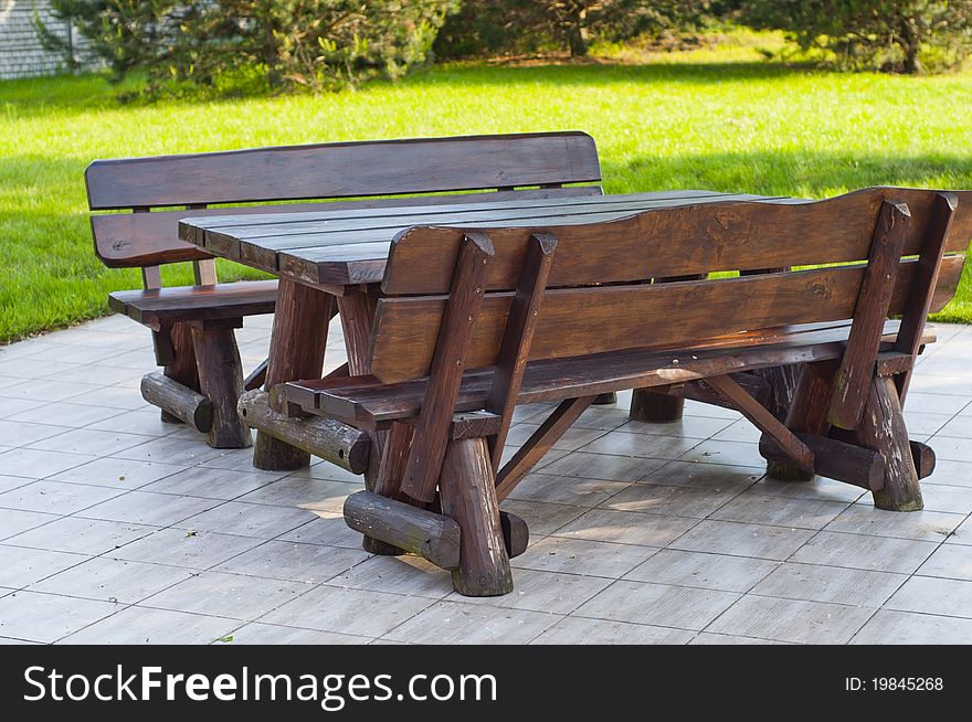 Sturdy wooden bench in the park