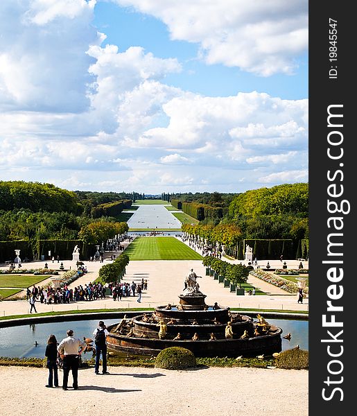 Decorative gardens with fountain background bright Cloud at Versailles in France , Photo on 17 September 2010. Decorative gardens with fountain background bright Cloud at Versailles in France , Photo on 17 September 2010