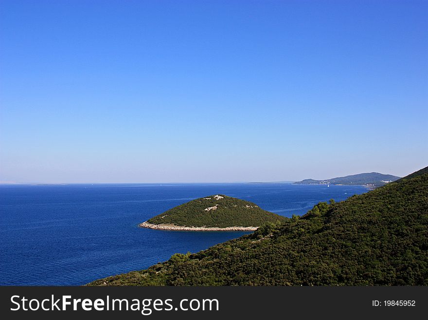 Islet in the sea near the coast of the island of Cres