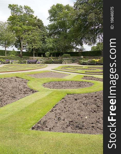 Ornamental garden with grass paths and flower beds