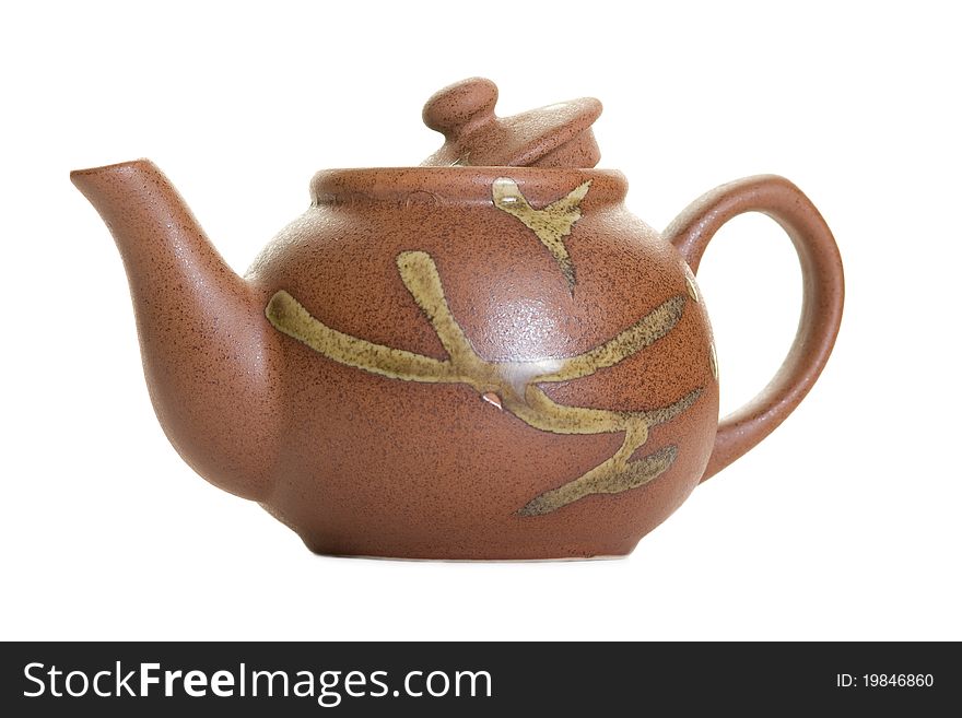 Ceramic teapot isolated over white