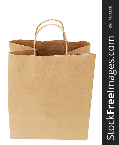 A single brown bag isolated white. A single brown bag isolated white