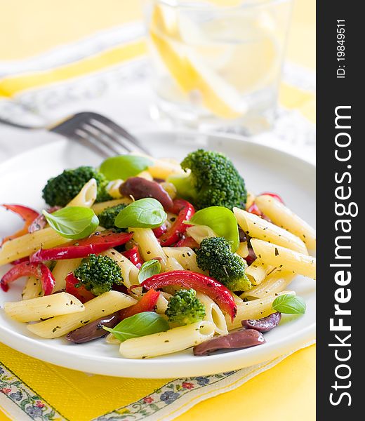 Pasta with pepper,broccoli and olive close up. Selective focus