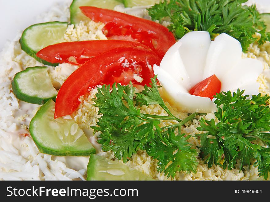 Salad with eggs, tomatoes, cucumbers and parsley