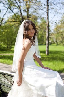 Beautiful Young Bride Sitting On Bench Royalty Free Stock Images Beautiful Young Bride Sitting On Bench Royalty Free Stock Images