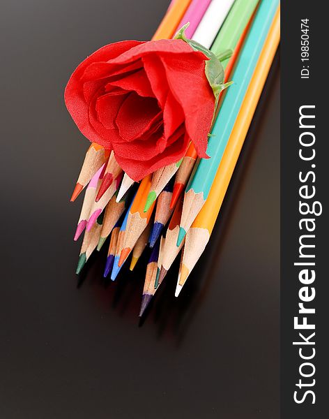 Colored Pencils With Fake Rose. Colored Pencils With Fake Rose