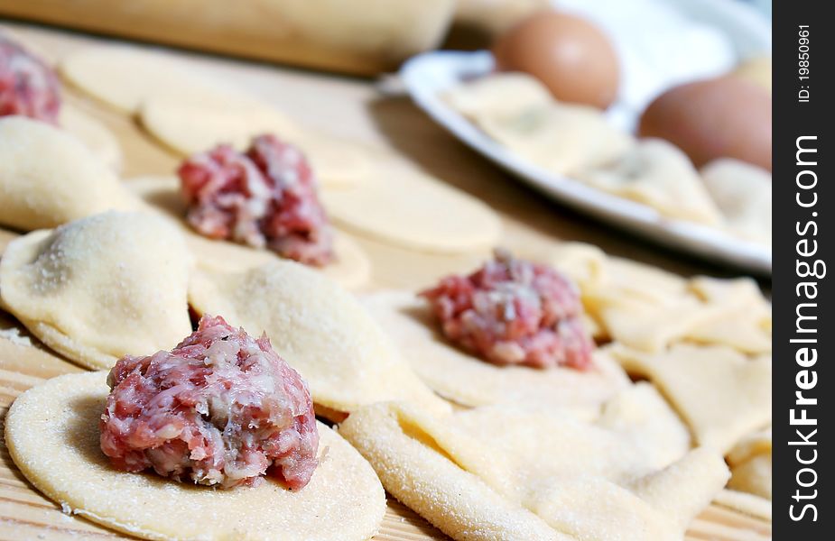 Preparing of pelmeni - meatballs in dough. Preparing of pelmeni - meatballs in dough