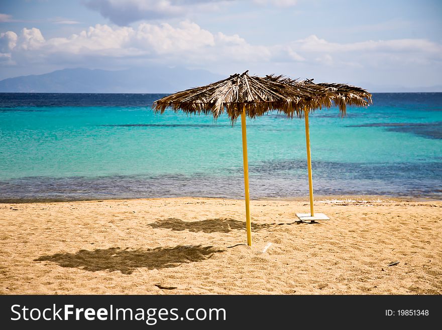 A Mikronow beach named Paradise beach in the day of sunny sky. A Mikronow beach named Paradise beach in the day of sunny sky